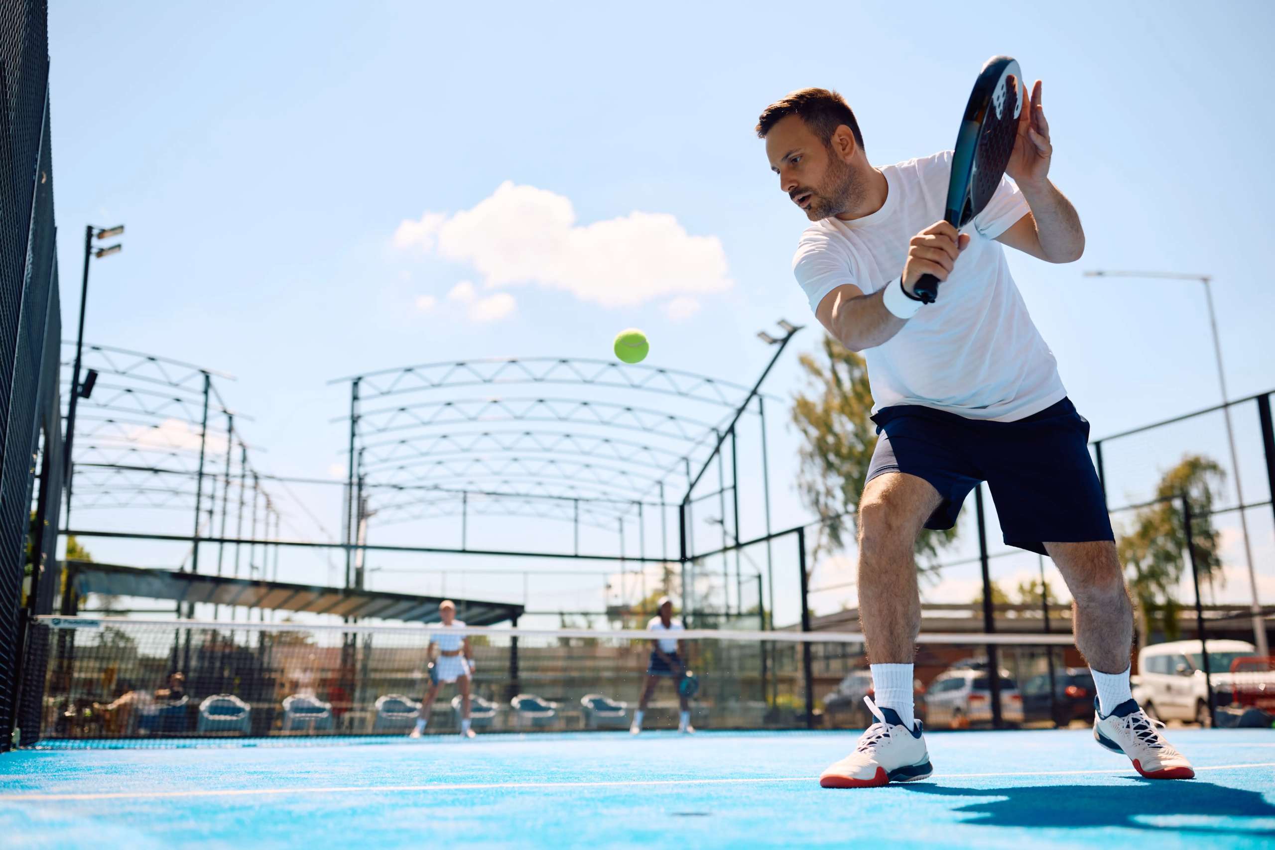 male-athlete-playing-padel-on-outdoor-court
